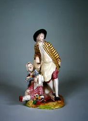 Sceaux vervaardiging beeldje van een jonge kuiper of smid met zijn twee dochters